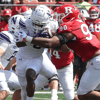 Sep 3, 2023; Piscataway, New Jersey, USA; Northwestern Wildcats wide receiver A.J. Henning (8) is tackled by Rutgers Scarlet Knights defensive lineman Rene Konga (90) during the second half at SHI Stadium. Mandatory (Vincent Carchietta-USA TODAY Sports)