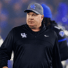 Kentucky Wildcats head coach Mark Stoops runs onto the field before a game against the Vanderbilt Commodores at Kroger Field. Mandatory Credit: Jordan Prather-Imagn Images