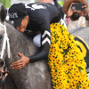 Jaime Torres celebrates a Preakness Stakes win with Seize the Grey, via Mitch Stringer-Imagn Images