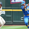 Jun 14, 2025; Omaha, Neb, USA; UCLA Bruins shortstop Roch Cholowsky (1) completes a double play as Murray State Races left fielder Dan Tauken (37) is out at second base during the second inning at Charles Schwab Field. Mandatory Credit: Steven Branscombe-Imagn Images