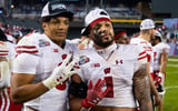 Wisconsin RB Chez Mellusi and former Badgers RB Braelon Allen