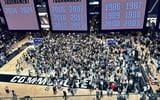Vanderbilt fans storm the court after the Commodores beat Kentucky (Photo by Tyler Thompson, Kentucky Sports Radio)