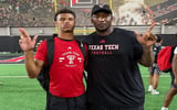 Isaiah Rasheed with Texas Tech Director of Player Personnel Brian Nance