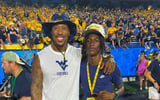 Mobile, Alabama, 2027 wide receiver Carter Davis with Bruce Irvin at West Virginia’s game against Pitt