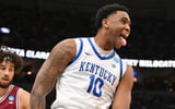 Mar 20, 2026; St. Louis, MO, USA; Kentucky Wildcats forward Brandon Garrison (10) reacts after dunking the ball against Santa Clara Broncos forward Allen Graves (22) during the second half of a first round game of the men's 2026 NCAA Tournament at Enterprise Center. Mandatory Credit: Jeff Curry-Imagn Images