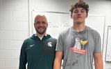 Indiana OT RJ Clem with Michigan State OT coach Nick Tabacca