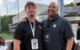 Tucker Wilson with another coachA