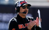 Oklahoma State coach Eric Morris calls a time out during a spring football game for the Oklahoma State University Cowboys at