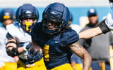 West Virginia running back Cam Cook