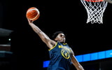Michigan Wolverines basketball guard Brandon McCoy Jr. dunks against the Lithuania Men's National Team. (Photo by Michigan basketball)