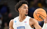2026-03-20T001322Z_237111410_MT1USATODAY28541799_RTRMADP_3_NORTH-CAROLINA-TAR-HEELS-GUARD-SETH-TRIMBLE-7-DRIVES-TO