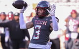 Peyton Morgan reacts to getting an interception during the Texas Tech football team's spring game, Friday, April 17, 2026, at