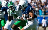 Penn State running back Carson Hansen (21) carries the ball during an NCAA football game against Marshall at Beaver Stadium,
