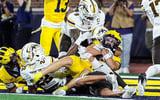 2026-09-06T074628Z_442129252_MT1USATODAY29756248_RTRMADP_3_MICHIGAN-WIDE-RECEIVER-JJ-BUCHANAN-6-CATCHES-FOR-A