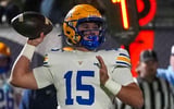 Battle Ground's Bo Bryan (15) throws the ball during a TSSAA high school football playoff game between Grace Christian and