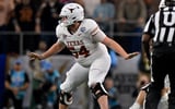 2025-01-14T032001Z_1114231424_MT1USATODAY25181901_RTRMADP_3_NCAA-FOOTBALL-COTTON-BOWL-OHIO-STATE-AT-TEXAS (1)