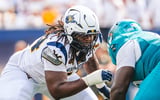 West Virginia offensive lineman Amare Grayson