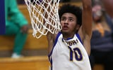 Bremertonís Jalen Davis (10) dunks the ball during their 94-42 win over South Kitsap on Tuesday, Dec. 2, 2025.