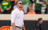Oregon head coach Dan Lanning takes in the rain as the Oregon Ducks face the Oklahoma State Cowboys on Sept. 12, 2026, at Boone