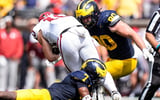 2026-09-12T181728Z_1771031815_MT1USATODAY29801366_RTRMADP_3_MICHIGAN-DEFENSIVE-END-JOHN-HENRY-DALEY-90-TACKLES