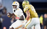 Tennessee quarterback Faizon Brandon (11) runs while defended during a college football game between Tennessee and Georgia Tech at Bobby Dodd Stadium in Atlanta, Ga., on Sept. 12, 2026.
