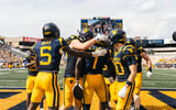 West Virginia celebrates Kedrick Triplett's first touchdown