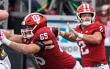 Indiana's Grant WIlson (2) throws a touchdown pass to Nick Marsh (11) during the Indiana versus Howard football game at Memorial