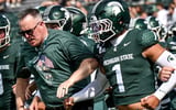 Michigan State coach Pat Fitzgerald, edge Kenny Soares Jr. (1) and the Spartans get fired up before the game against Eastern Michigan on Saturday, Sept. 12, 2026, at Spartan Stadium in East Lansing. (Photo credit Nick King/Lansing State Journal / USA TODAY NETWORK via Imagn Images)