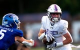 Elder Panthers wide receiver Andrew Lyman (1) scores a touchdown during the game between Elder and Covington Catholic at Dennis