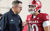 Indiana Head Coach Curt Cignetti talks with Josh Hoover (10) during the Indiana versus Northwestern football game at Memorial