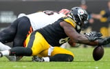 Pittsburgh Steelers defensive tackle Sebastian Joseph-Day (69) dives on a loose ball fumbled by Cincinnati Bengals quarterback