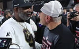 Nov 9, 2024; Lubbock, Texas, USA; Colorado Buffalos head coach Deion Sanders and Texas Tech Red Raiders head coach Joey McGuire after the game at Jones AT&T Stadium and Cody Campbell Field.
