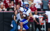 Oct 3, 2026; Columbia, South Carolina, USA; Kentucky Wildcats wide receiver Nic Anderson (4) makes a touchdown reception against the South Carolina Gamecocks in the second half at Williams-Brice Stadium. Mandatory Credit: Jeff Blake-Imagn Images