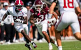 Mississippi State wide receiver Anthony Evans III (3) carries the ball during a college football game between Mississippi State