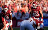 Oklahoma's John Mateer (10) lines up in the second half of the Red River Rivalry college football game between the University of