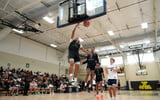 Jet Academy Tai Bell (11) dunks the ball during the second day of the 2026 Nike EYBL Peach Jam at Riverview Park Activities