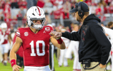 Oct 17, 2026; Norman, Oklahoma, USA; Oklahoma Sooners quarterback John Mateer (10) greets offensive coordinator Ben Arbuckle before the game against the Kentucky Wildcats at Gaylord Family-Oklahoma Memorial Stadium. Mandatory Credit: Kevin Jairaj-Imagn Images