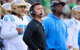 UCLA Bruins head coach Bob Chesney watches a replay during the second half in a game against the Oregon Ducks at Autzen Stadium. - Troy Wayrynen, USA TODAY Sports