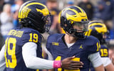 2026-10-24T153841Z_1615588573_MT1USATODAY30171487_RTRMADP_3_MICHIGAN-QUARTERBACK-TOMMY-CARR-14-HUGS-QUARTERBACK-BRYCE (1)