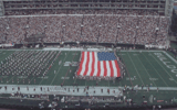 South Carolina and Mississippi State players joined together with military personnel to unfurl the American flag in the first major sporting event after 9/11. Photo credit: Mississippi State Athletics | @msstate on Twitter/X