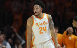 Jan 13, 2026; Knoxville, Tennessee, USA; Tennessee Volunteers guard Troy Henderson (24) reacts after a play against the Texas A&M Aggies during overtime at Thompson-Boling Arena at Food City Center. Mandatory Credit: Randy Sartin-Imagn Images