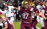 Bishop Watterson's Jack Schuler (87) celebrates after CJ Youell (40) got a sack against Toledo Central Catholic in the second half of the Division III State Championship game at Tom Benson Hall of Fame Stadium on Friday, Dec. 6, 2024 in Canton, Ohio. (© Samantha Madar/Columbus Dispatch / USA TODAY NETWORK via Imagn Images)