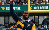 Noel Devine honored at halftime