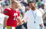 2026-04-25T204816Z_1051784485_MT1USATODAY28811969_RTRMADP_3_NOTRE-DAME-QUARTERBACK-CJ-CARR-13-AND-HEAD-COACH-MARCUS (1)