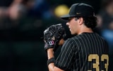 Vanderbilt pitcher Luke Guth (33) sets up to pitch against Louisville during the seventh inning at Hawkins Field in Nashville,