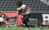 Oregon State's AJ Newberry runs the ball during fall camp at Reser Stadium on Wednesday, Aug. 5, 2025, in Corvallis, Oregon.