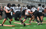 Oregon State offensive linemen run drills during fall camp at Reser Stadium on Wednesday, Aug. 5, 2025, in Corvallis, Oregon.