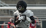 Oregon State's Aaron Butler runs after the catch during fall camp at Reser Stadium on Wednesday, Aug. 5, 2025, in Corvallis,