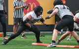 Oregon State's Tyler Voltin, left, does blocking drills during fall camp Aug. 5 at Reser Stadium in Corvallis.