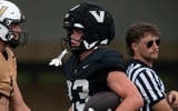 Vanderbilt running back Evan Hampton (23) finishes up a run during practice at Vanderbilt Universitys McGugin Center practice